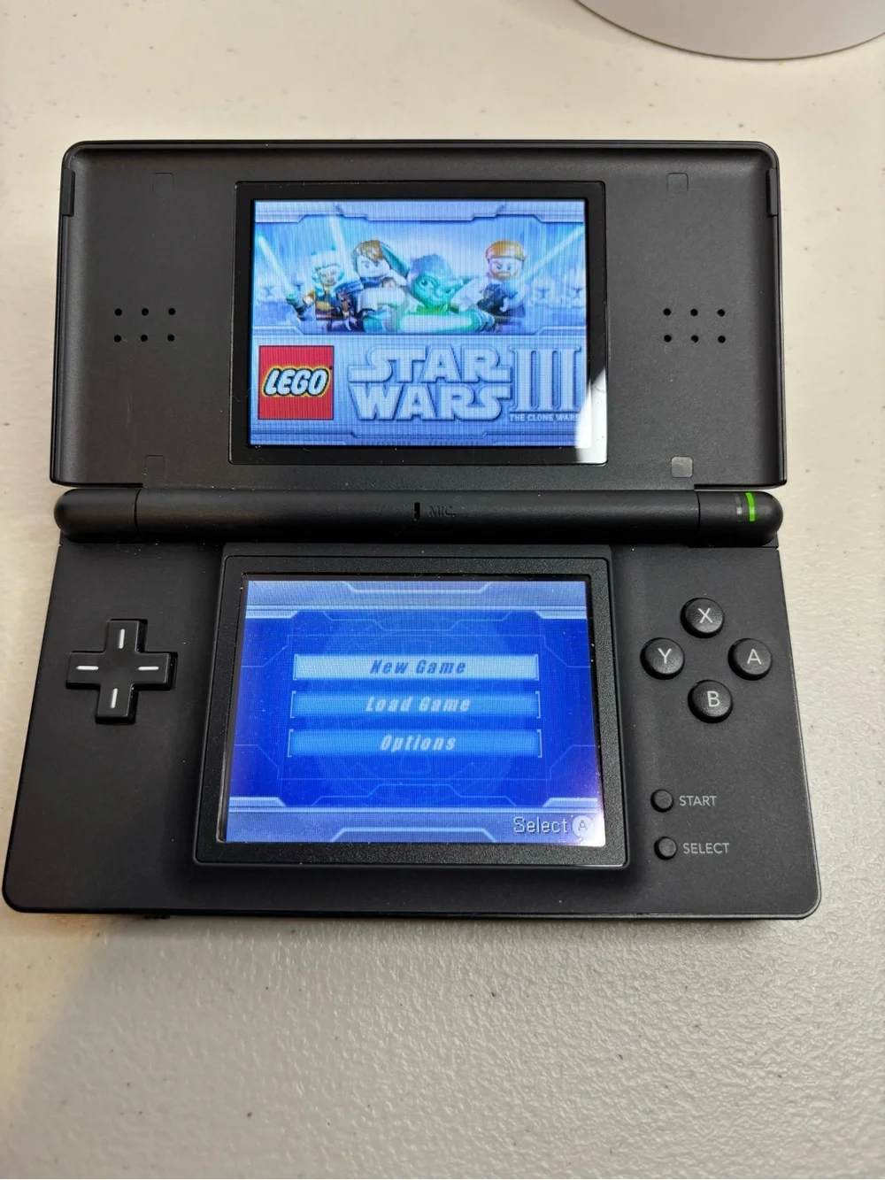 Nintendo DS Lite Bundle - Complete Handheld Console with Charger and Two Games